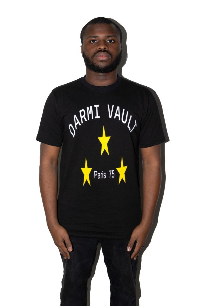 DARMI VAULT Paris 75 tee, three yellow stars, worn front view on white studio background